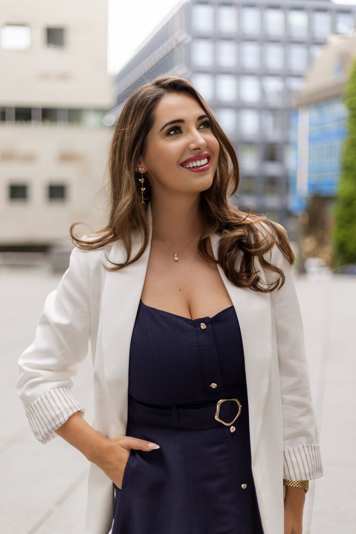 Mihaela Motica outdoors, looking to the side